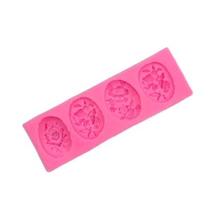 Pink silicone mold with flower and butterfly patterns for DIY soap and chocolate making