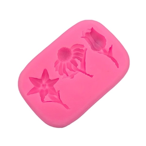 Pink silicone mold with tulip and sunflower shapes for DIY fondant and chocolate baking