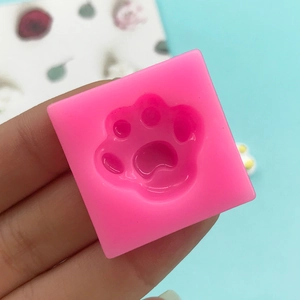 Pink silicone cat paw mold for DIY baking, fondant, and resin crafts handmade tools