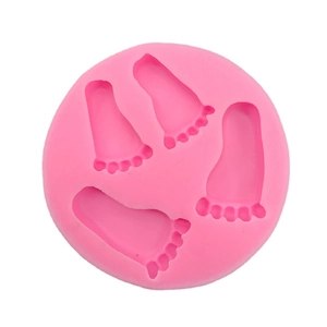 Moule rond en silicone rose avec quatre empreintes de pieds de bébé pour pâtisserie DIY