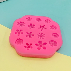 Pink silicone mold for DIY flower chocolates and cakes shown at a 45-degree angle