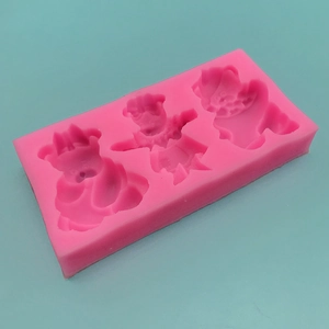 Pink silicone mold with three cartoon bear shapes for DIY cake and chocolate decorating