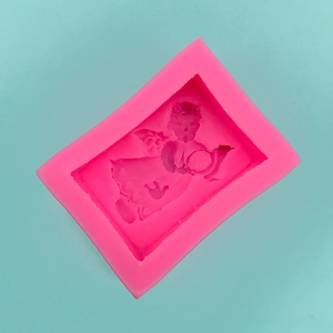 Macro detail of a 3D cherub silicone mold for fondant chocolate and cake decorating