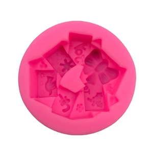 Pink silicone mold with 3D bow, bird and flower shapes for cake decorating and DIY crafts