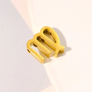 Minimalist gold Virgo zodiac pendant in stainless steel with a brushed metallic texture