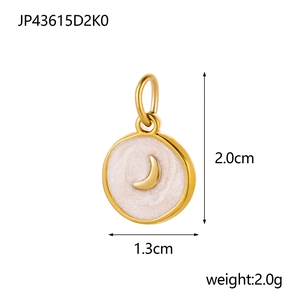 Golden stainless steel round charm with celestial moon motif and white enamel finish