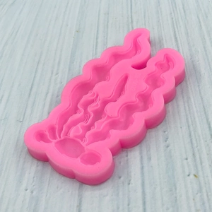 Pink silicone coral seaweed mold for cake decorating and fondant with 3D texture