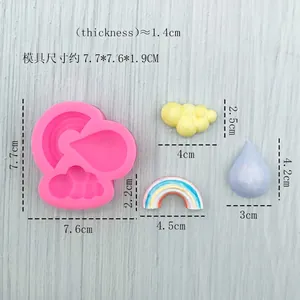 Pink silicone mold with DIY rainbow cloud and water drop shapes for cake baking and decoration