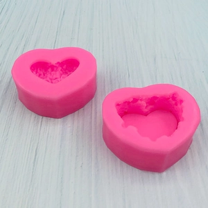 Two-piece heart-shaped pink silicone molds for DIY baking and handmade crafts