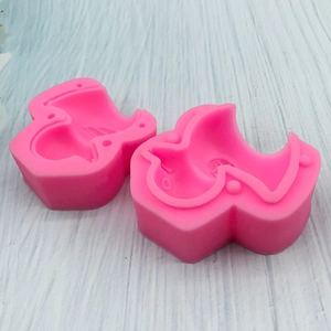 Set of 2 pink 3D boot-shaped silicone molds for chocolate mousse and fondant crafting