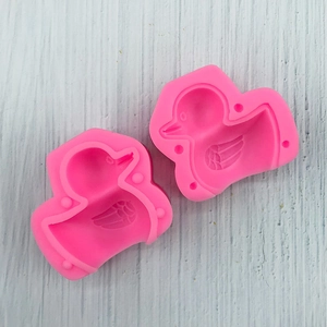 Detail of pink silicone 3D duck molds for DIY handmade soap and candle making crafts
