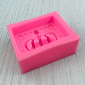 Pink silicone crown and flower mold for baking, chocolate, and DIY soap crafts