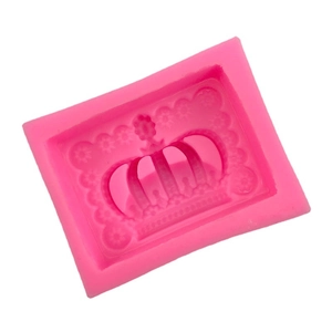 Pink silicone crown mold for fondant and chocolate cake decorating with lace details