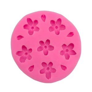Pink cherry blossom silicone mold with five-petal flower and petal cavities for DIY baking