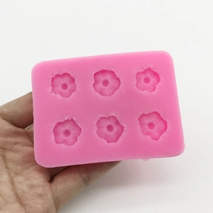 Pink silicone daisy flower mold with 6 cavities for DIY handmade soap and baking