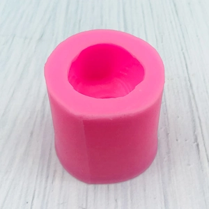 Cylindrical pink silicone mold for 3D little yellow duck DIY crafts and baking