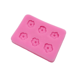 Pink 6-cavity silicone daisy mold for floral resin DIY, chocolate, and cake decorating