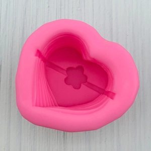 Detail of pink 3D heart flower silicone mold with layered texture for baking decoration