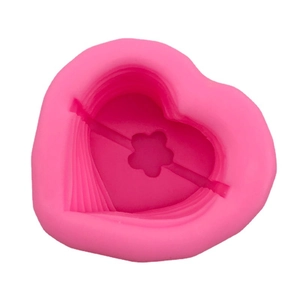 Pink heart-shaped silicone mold with 3D flower pattern for cake baking and chocolate DIY