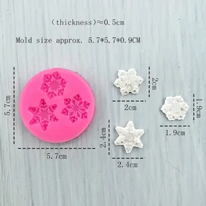 Pink silicone mold featuring three snowflake shapes for DIY soap, chocolate, and resin crafts