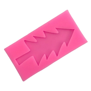 Pink silicone mold with Christmas tree design for DIY fondant and chocolate cake decoration