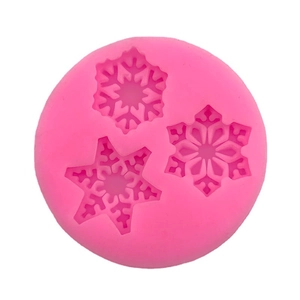 Pink silicone snowflake mold for DIY soap, chocolate, and cake decorating tools