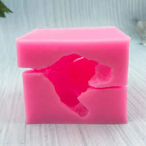 Close-up of pink silicone rabbit mold for 3D cake baking and handmade resin DIY crafts