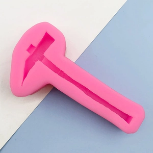 Detailed pink silicone pickaxe tool mold for chocolate fondant or plaster craft DIY