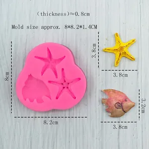 Pink silicone mold featuring starfish and tropical fish designs for cake decoration