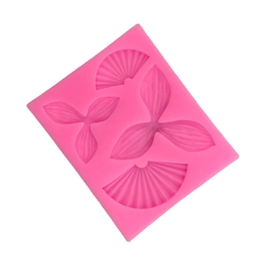 Pink silicone mold featuring folding fan and leaf shapes for fondant cake decorating