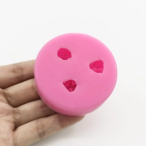 Stampo in silicone rosa con tre piccole cavità floreali per resina e candele fai-da-te
