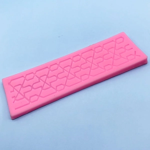 Pink silicone fondant lace mold with geometric patterns for DIY cake border decoration
