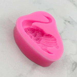 Pink swan silicone mold for cake decorating and chocolate DIY, 45-degree top view