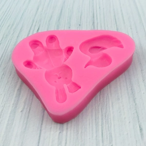 Pink silicone mold featuring cute rabbit and duck shapes for DIY fondant and chocolate cake
