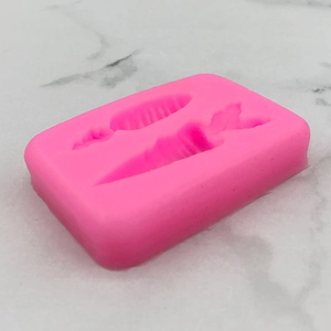 Carrot shaped silicone mold for DIY baking and cake decoration in rose pink finish