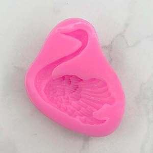 Detailed swan silicone mold for fondant and cake decorating with intricate feather texture
