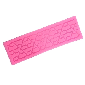 Pink silicone fondant mold with geometric lace pattern for cake border decorating