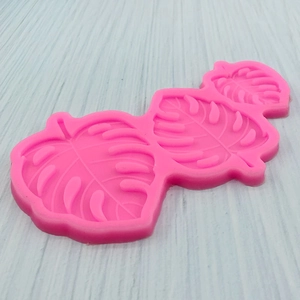 Pink silicone monstera leaf mold for fondant chocolate and cake decoration crafts