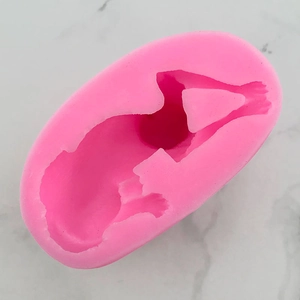 Close-up of pink silicone Chihuahua mold for handmade soap and chocolate making