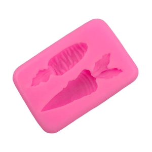 Bright pink silicone mold with carrot shapes for fondant cake decorating and DIY baking