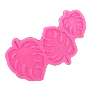 Pink silicone monstera leaf mold for chocolate cake decoration and DIY crafts