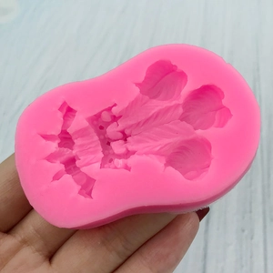 Pink silicone mold with crown and feather textures for DIY cake fondant and chocolate