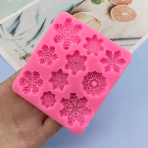 Pink silicone snowflake mold with 10 cavities for fondant and chocolate baking
