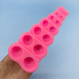 Lebensmittelechte Silikonform in Rosa mit 10 Halbkugeln für Backen und Schokolade