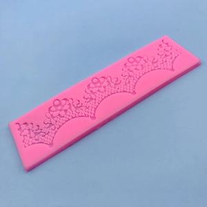 Pink lace silicone mold with floral patterns for DIY fondant cake decoration and baking