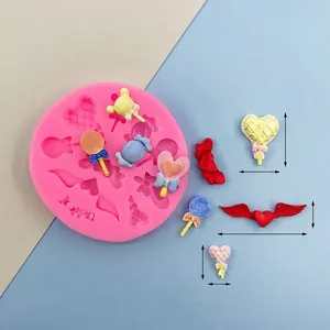 Rosa Silikonform mit Herz-Flügel-Motiv für DIY Süßigkeiten, Größe 8,6x8,3x1,2cm Dekor