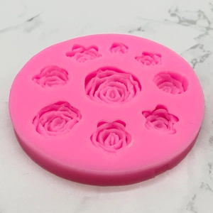 Moule en silicone rose avec huit motifs de roses variés pour décor de gâteau et artisanat