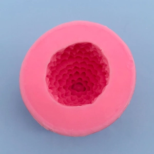 Detailed top view of a pink 3D silicone pinecone mold for cake decorating and DIY crafts