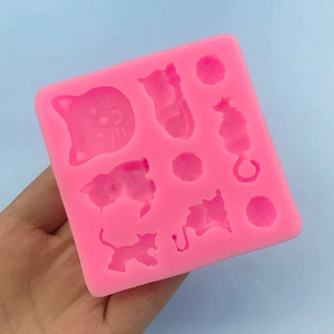 Pink silicone cat and yarn ball mold for DIY fondant cake decoration and soap making