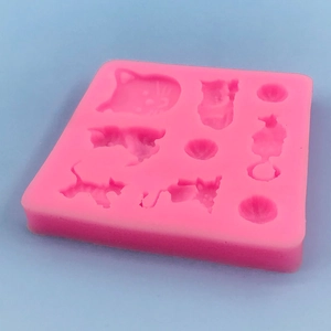 Pink silicone cat and yarn ball mold for fondant cake decorating and handmade soap crafts